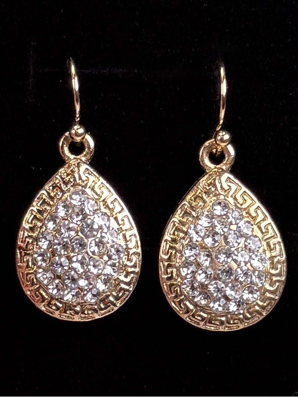Beautiful goldtone and clear crystal accent pierced teardrop earrings